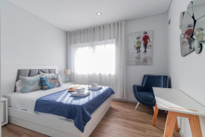 Downtown 1BR Apartment W/ Balcony by LovelyStay